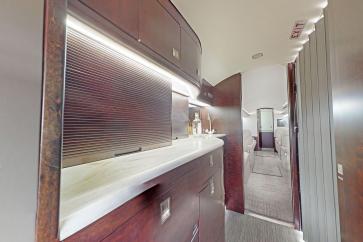 Enjoy drinks, snacks or full meal onboard, as this Bombardier 600 Series Private Jet features a full galley with microwave, oven and refrigerator. 