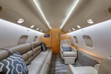Divan and reclining seats in an Embraer business jet